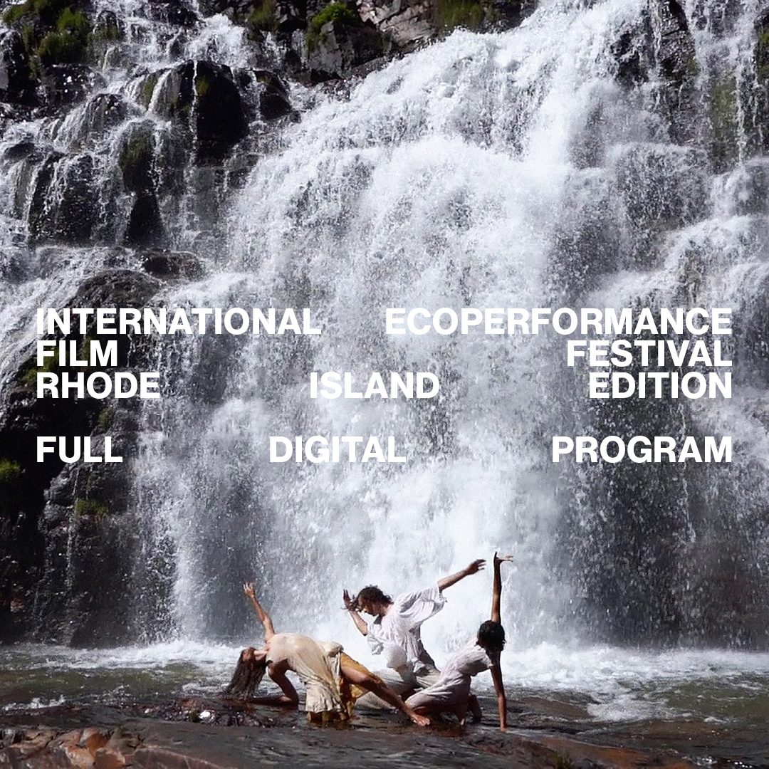 Three people dance in front of a water fall.