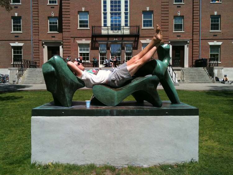 person reclining on Henry Moore's Reclining Figure No. 2 - Bridge Prop