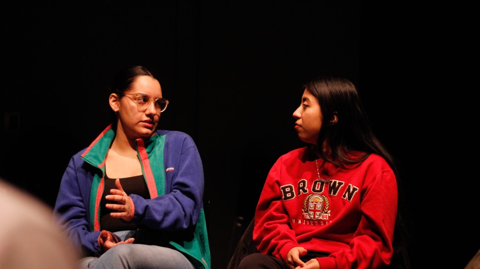 two Black Music Lab Mixer attendees talking to each other