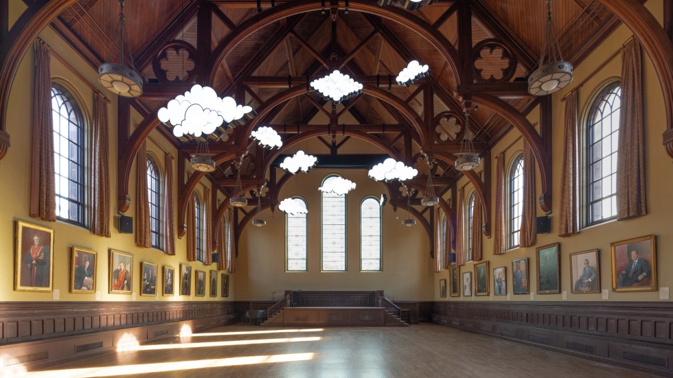 LED cloud sculptures hanging from the ceiling of Sayles Hall