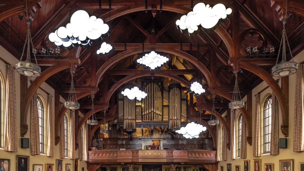 LED cloud sculptures hanging from the ceiling of Sayles Hall