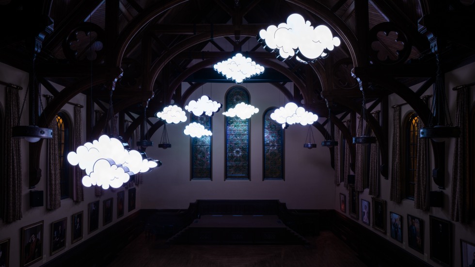 LED cloud sculptures hanging from the ceiling of Sayles Hall