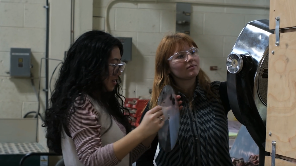 Two students work on a project in the Brown Design Workshop.