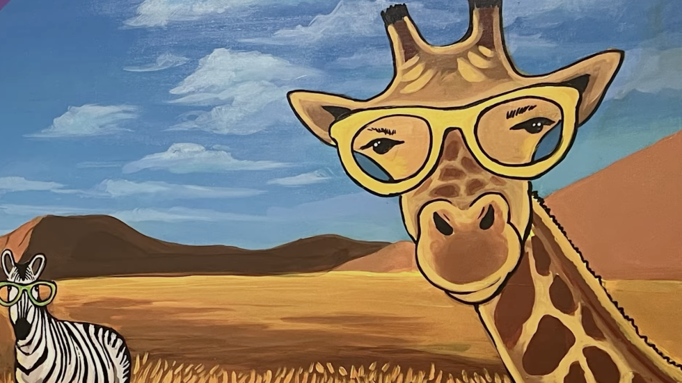 A whimsical painting of a giraffe wearing large yellow glasses in the foreground and a zebra wearing green glasses in the background of a savanna landscape.